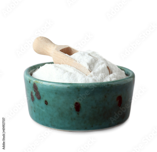 Bowl with sweet fructose powder and scoop isolated on white