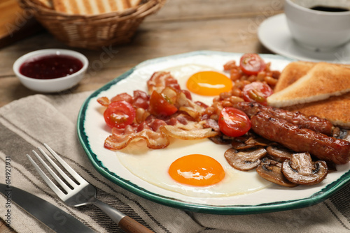Traditional English breakfast served on table, closeup