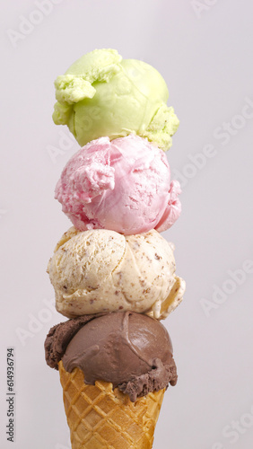 Vertical front view CU, ice cream sherbet on top strawberry Chocolate Chip and Chocolate isolated on white background.