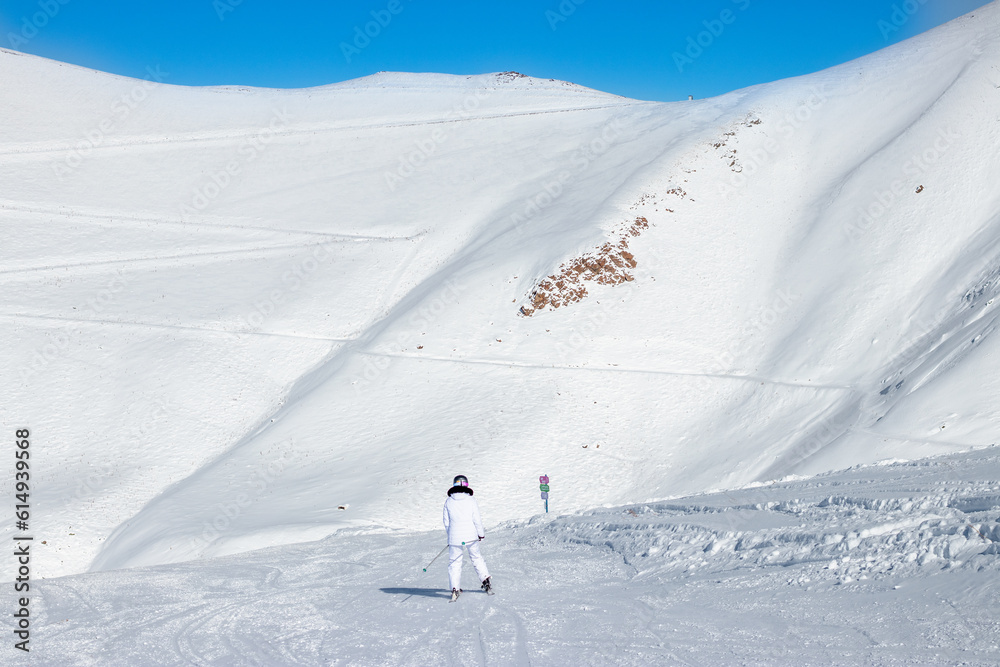 Tourists skiing in Palandoken mountain. Enjoying skiing on a sunny day