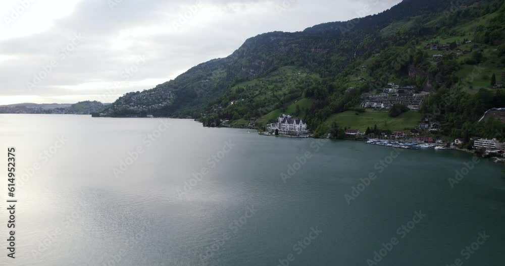 Idyllic View Of The City And Alps Mountains In Lake Lucerne, Central Switzerland. Aerial Wide Shot Idyllic View Of The City And Alps Mountains In Lake Lucerne, Central Switzerland. Aerial Wide Shot