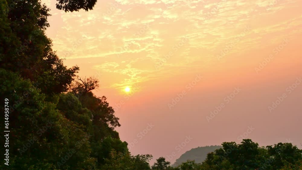 Scenery sunrise at Bann Mong Kunchangkien the deep Mong hill tribe village on Doi Pui..The view was breathtakingly beautiful, .with the morning sun painting the sky in shades of pink and orange. Scenery sunrise at Bann Mong Kunchangkien the deep Mong hill tribe village on Doi Pui..The view was breathtakingly beautiful, .with the morning sun painting the sky in shades of pink and orange.