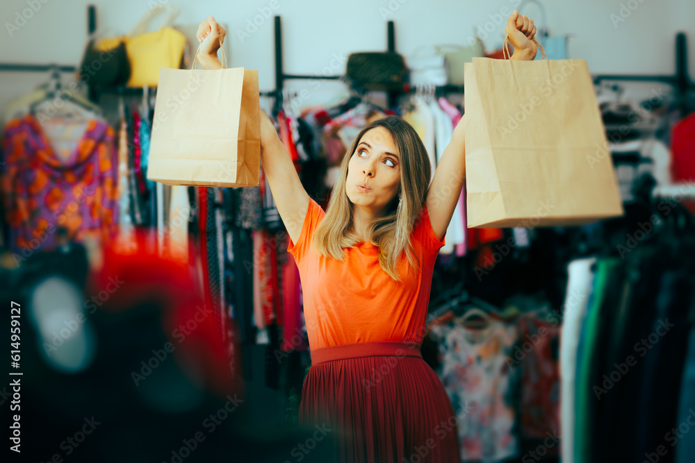 Happy Woman Holding Shopping Bags Feeling Excited. Compulsive shopper feeling endorphin and dopamine rush 
 - obrazy, fototapety, plakaty 