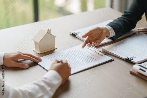 Approved stamp with Business people signing contract making deal with real estate consultant home insurance.Real estate investment Property insurance security offer house.