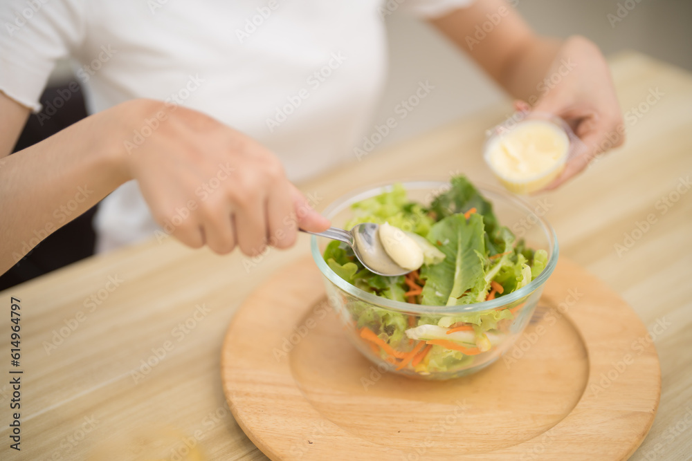 Asian woman dieting Weight loss eating fresh fresh homemade salad healthy eating concept Asian woman dieting Weight loss eating fresh fresh homemade salad healthy eating concept