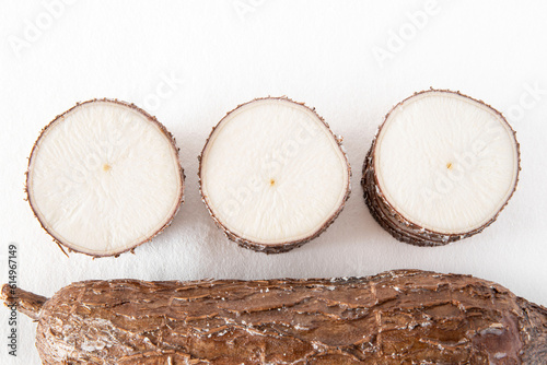 Close-up of a manioc root against a white background