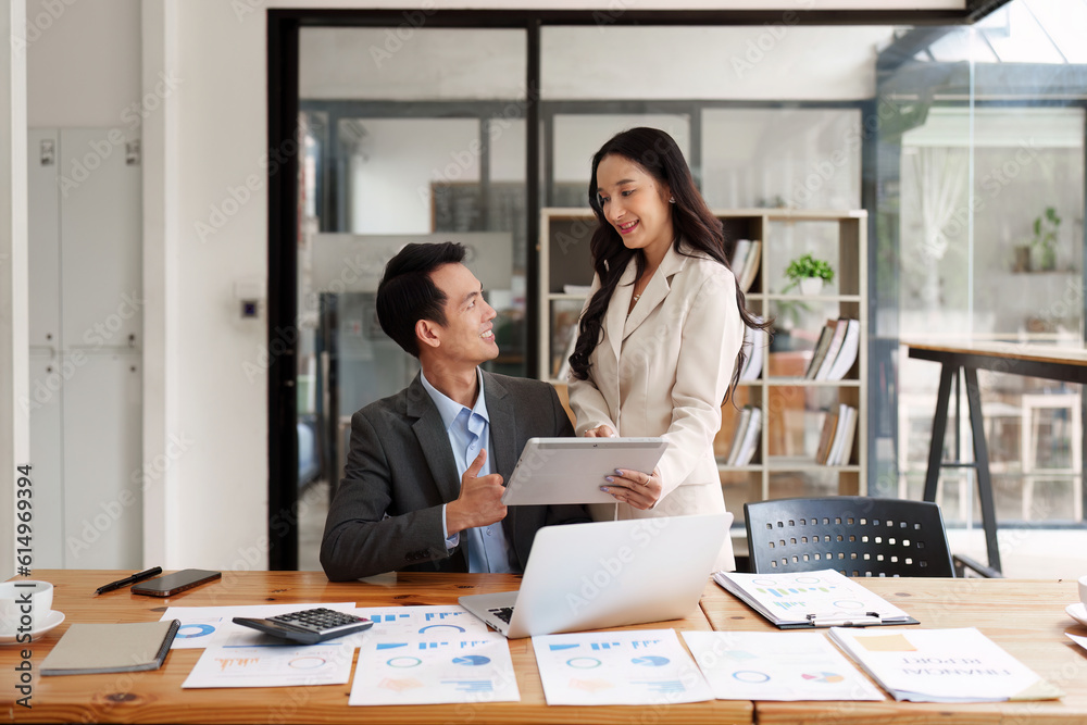 Fund managers team consultation and discuss about analysis Investment stock market by digital tablet Fund managers team consultation and discuss about analysis Investment stock market by digital tablet