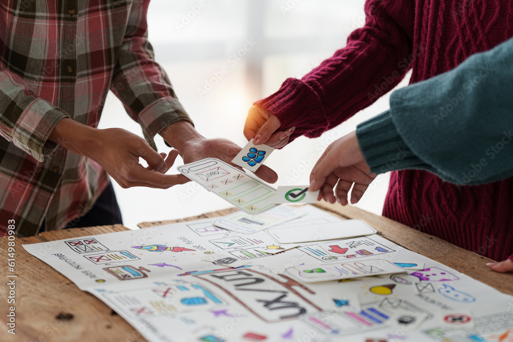Close up ux developer and ui designer brainstorming interface wireframe design.Creative digital development agency Close up ux developer and ui designer brainstorming interface wireframe design.Creative digital development agency