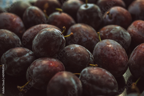 Fresh plums on the table, close-up © Branimir