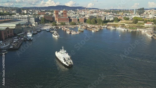 Large yachts approach the marina of Pipervika in Oslo Norway photo