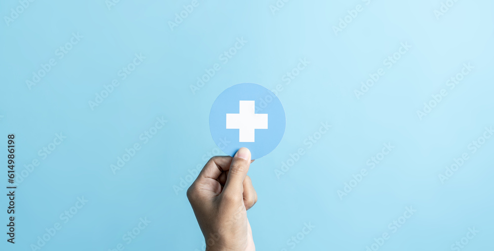 Health insurance concept. people hand holding plus and healthcare medical. health and access to welfare health concept. Health insurance concept. people hand holding plus and healthcare medical. health and access to welfare health concept.