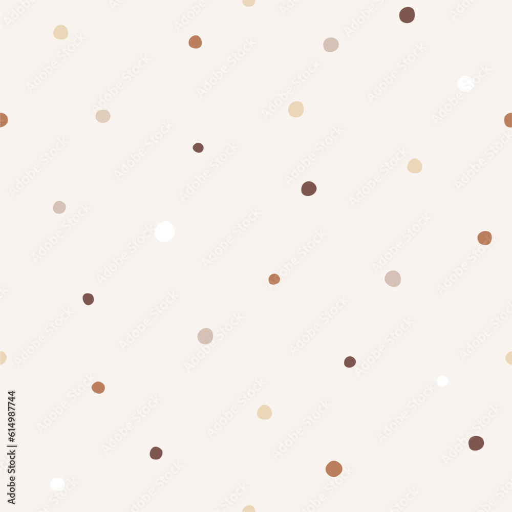 Seamless pattern with brown hand drawn dots on a beige background.