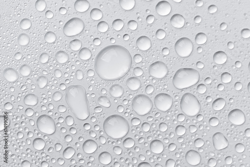 Tableau sur toile Water drops on grey background. Abstract water drop background.