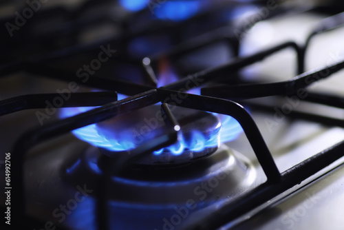 Kettle with a whistle on the gas stove. Built-in gas panel. The kettle is on the stove.Gas crisis