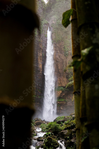 Kapas Biru Waterfall is a beautiful waterfall located in Lumajang, East Java. photo