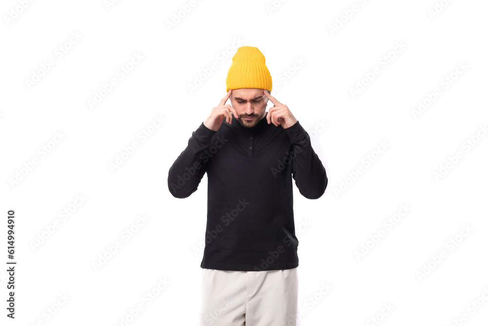 smart authentic brunet male adult in black sweatshirt thinks about strategy and idea smart authentic brunet male adult in black sweatshirt thinks about strategy and idea