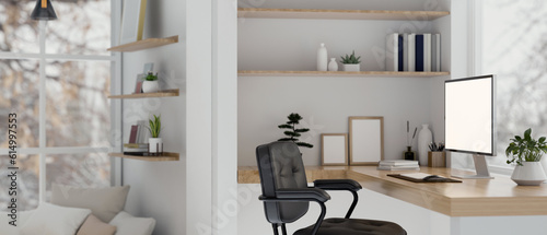 Rear view of a white beautiful minimalist Scandinavian home office with computer mockup