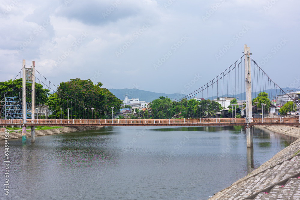 Fototapeta premium Lampang Wang River , beautiful nature landscape of irrigation water canal in Northern Lampang province in Thailand.