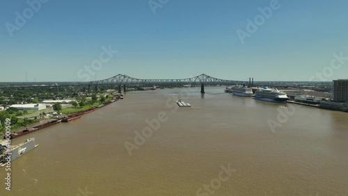 Barge and Pushboat cruising on the Mississippi River near New Orleans
 photo