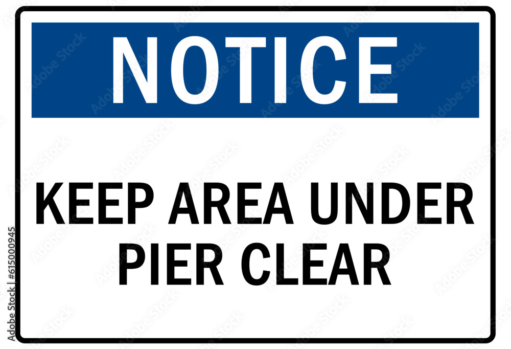 Beach safety sign and labels keep area under pier clear Beach safety sign and labels keep area under pier clear
