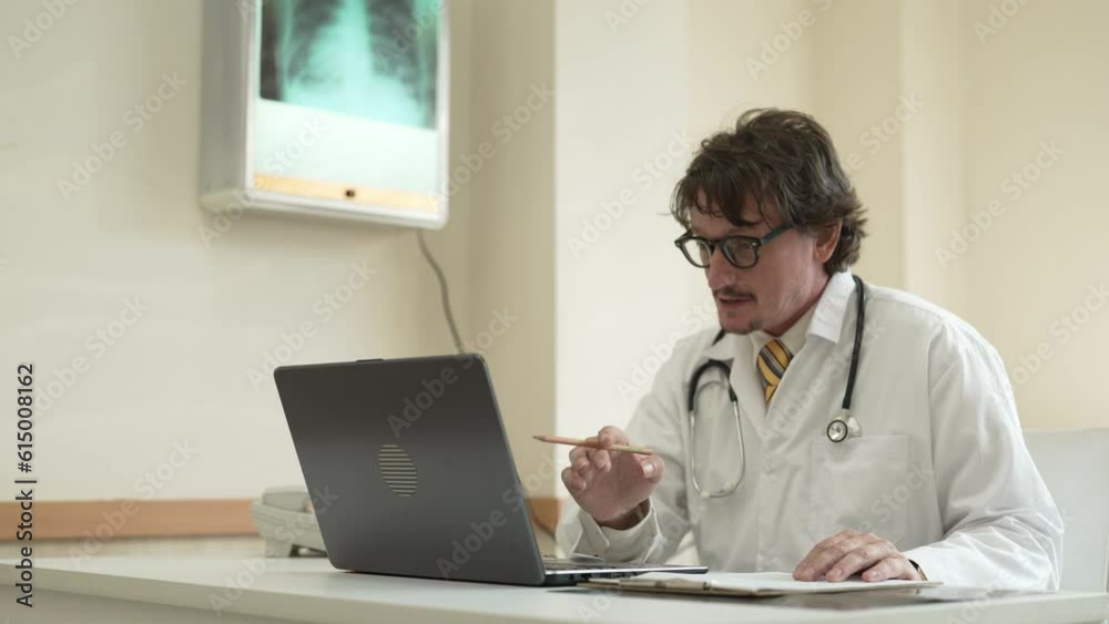 Telemedicine doctor video conference call for follow up. Doctor using laptop remotely with medical result at clinic. Concept of customer service, healthcare, online digital technology, counselor and m Telemedicine doctor video conference call for follow up. Doctor using laptop remotely with medical result at clinic. Concept of customer service, healthcare, online digital technology, counselor and m
