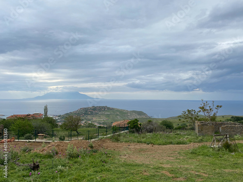 Eski Bademli - Gliki Village, Aegean sea and Greek island Samothrace view from Gokceada, Canakkale Turkey. Imbros island panoramic city view photo
