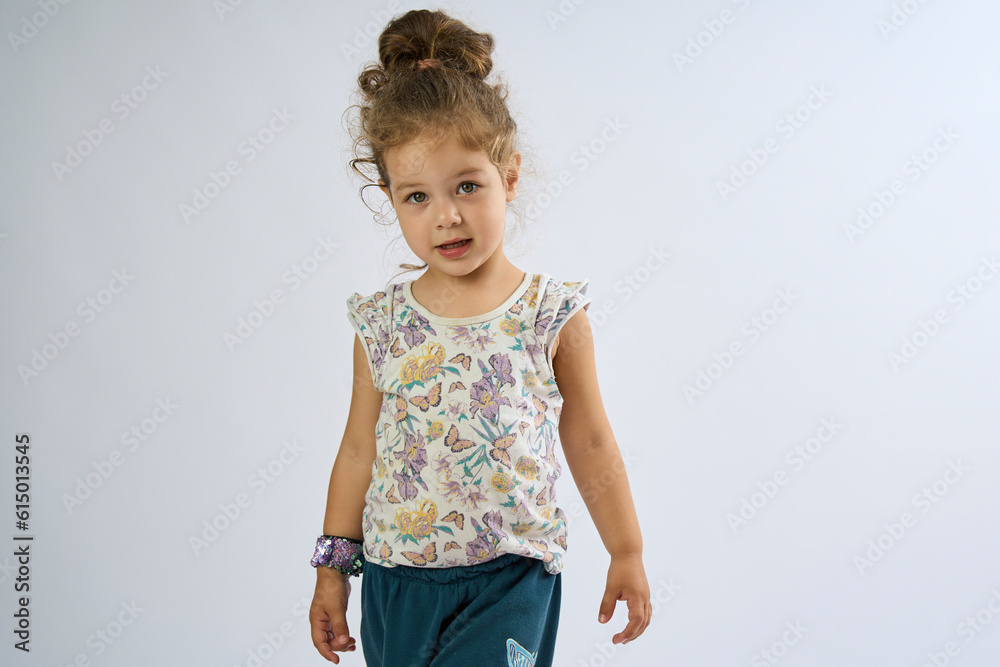Portrait of Cute little girl with curly hairs on white background Portrait of Cute little girl with curly hairs on white background