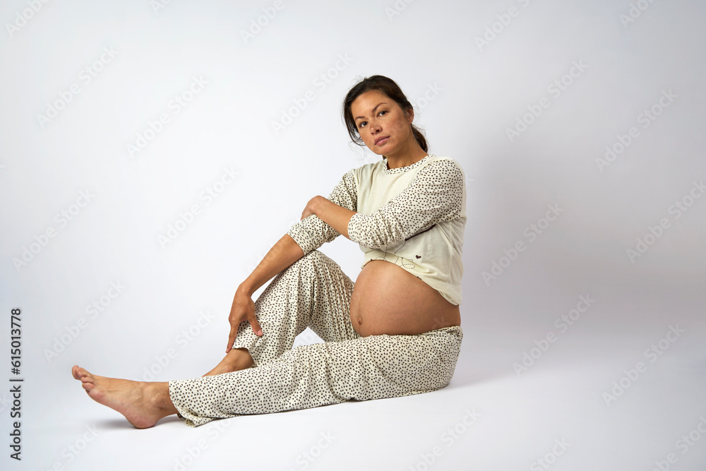 Happy pregnant woman on white background with copy space Happy pregnant woman on white background with copy space