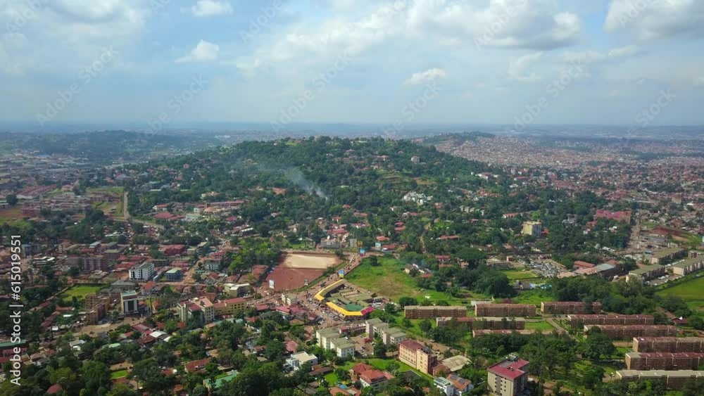 Suburban Neighborhood Of Bugolobi With Mbuya Hill In The Background In Kampala, Uganda. Aerial Shot Suburban Neighborhood Of Bugolobi With Mbuya Hill In The Background In Kampala, Uganda. Aerial Shot