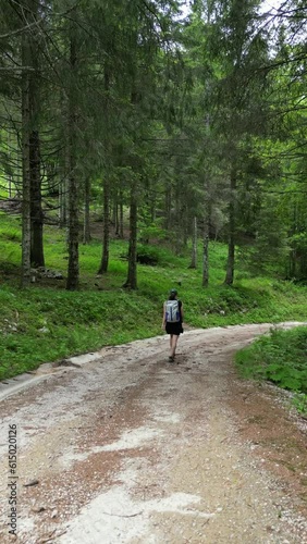 girl walking in the woods