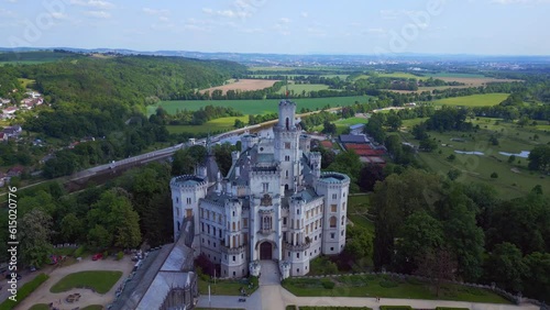 astle In the shade. Fantastic aerial top view flight. Fairy tale castle in Czech Republic Europe, summer day 2023. fly reverse drone
4K cinematic. photo