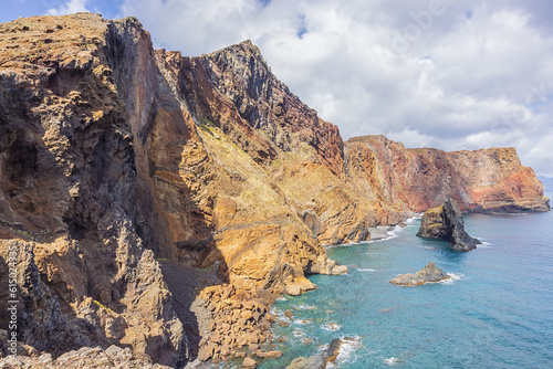 Brightly colored steep cliffs rising up from the ocean at the Ponta de Sao Lourenço, the most eastern tip of Madeira