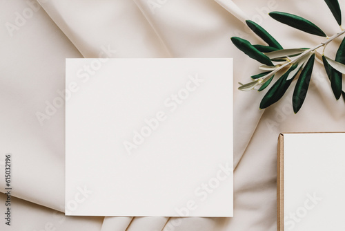 Delicately white silk background, white A4, A6 paper cards, business cards and flyers for a cosmetic company, beauty industry. Soft background, gentle colors. Generative AI