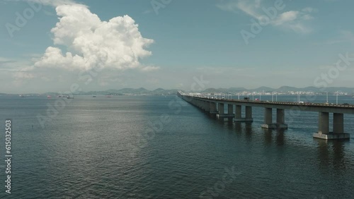 Wallpaper Mural Aerial revealing panoramic view Rio-Niteroi Sea-crossing concrete bridge with vehicles in traffic over Guanabara bay. Vehicles in highway traffic in Brazil Torontodigital.ca