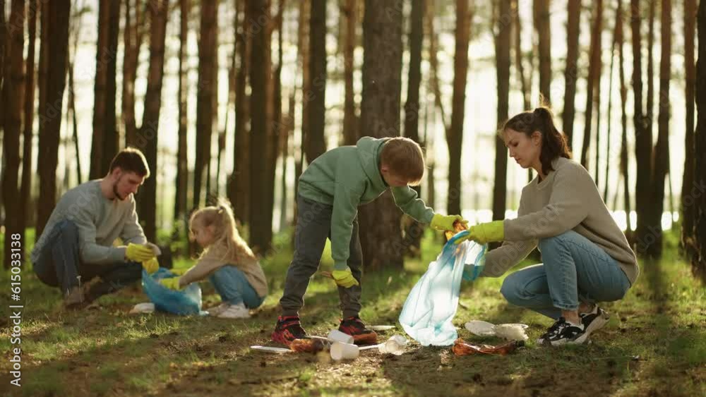 Happy Family Spending Weekend In Nature, Cleaning Forest From Plastic Waste, Environment Protection Happy Family Spending Weekend In Nature, Cleaning Forest From Plastic Waste, Environment Protection