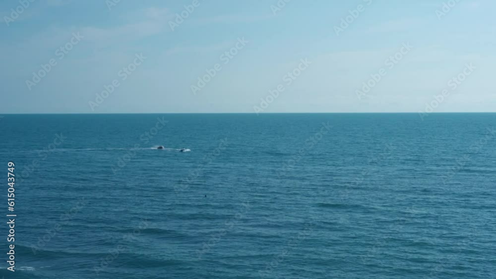 Blue Sea Blue Sky Cirrus White Clouds 4K, Landscape. Beautiful Seascape. Ocean and Blue Skyscraper with Light White Clouds, Nature Background. Blue Sea Blue Sky Cirrus White Clouds 4K, Landscape. Beautiful Seascape. Ocean and Blue Skyscraper with Light White Clouds, Nature Background.