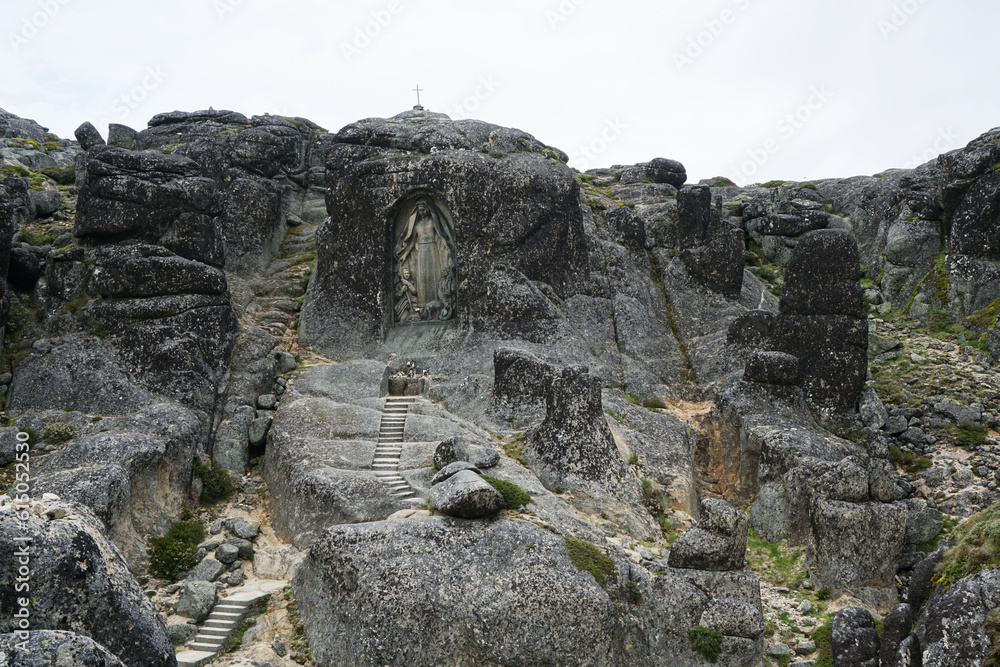 Huge rock carved with the Our Lady of the Good Star, in Serra da Estrela Natural Park, Portugal
