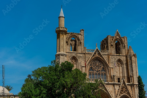Lala Mustafa Pasha Camii Mosque or old Cathedral of Saint Nicholas with minaret in Famagusta or Gazimagusa historical city centre. Northern Cyprus. Copy space for text.