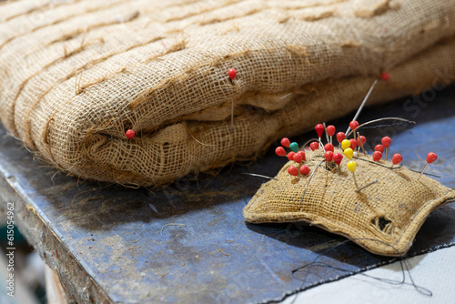 Bilde på lerret Pin cushion and raw molded padding filled with plant fiber for a seat in an upho