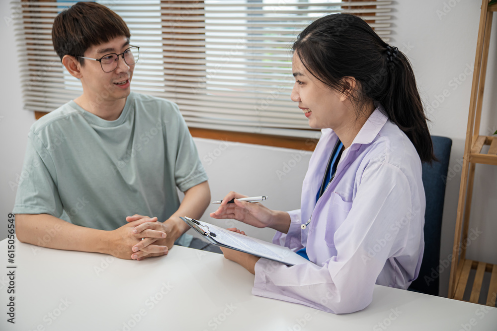 Doctor healthcare. Professional medical doctor in white uniform gown coat interview consulting patient reassuring his male patient helping hand