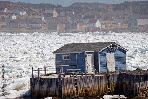 Fishing stages, in the town of Twillingate, surrounded by pack ice, Newfoundland and Labrador, Canada.