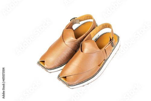 The Peshwari chappal or tsaplay are worn by men casually or formally, usually with the shalwar kameez in summer use as a sandals or slippers in Pakistan. photo