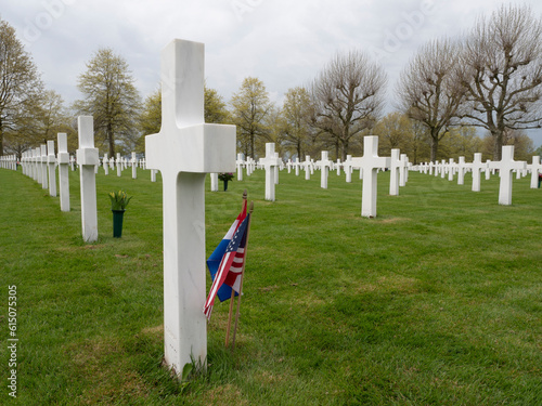 Memorial liberation day at American cemetery with white crosses with Dutch and American flag in Margraten, the Netherlands