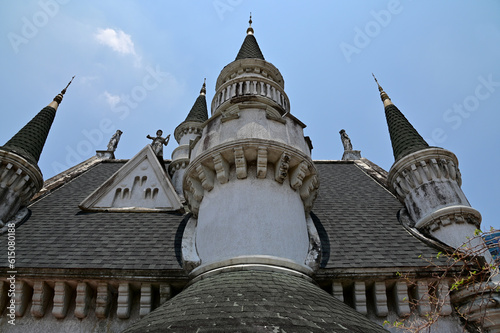 BANGKOK, THAILAND - JUNE 21, 2023 : The Beautiful Ancient Old Castle at JODD FAIRS DanNeramit with blue sky background at Thailand. photo