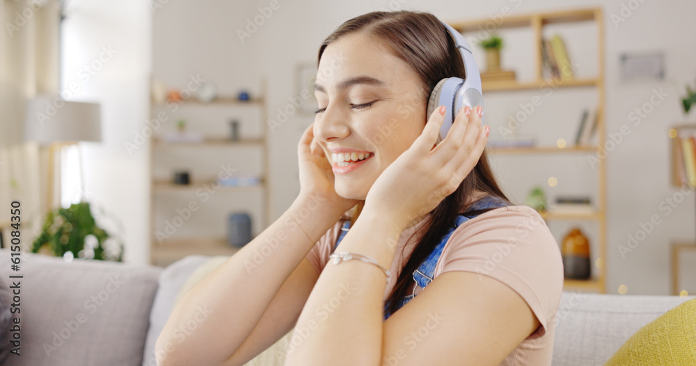 Music, happy and woman with headphones, dance and motivation in living room, home and radio. Female model, girl and person with headset, streaming audio or sounds for inspiration, dancing or movement Music, happy and woman with headphones, dance and motivation in living room, home and radio. Female model, girl and person with headset, streaming audio or sounds for inspiration, dancing or movement