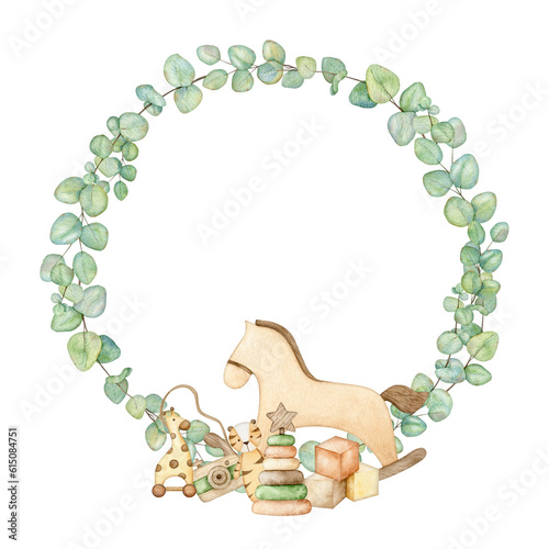 Bilde på lerret Baby shower frame with wooden toys pyramid, camera, rocking horse, cubes, plush tiger, giraffe on wheels, teething toy in eucalyptus wreath