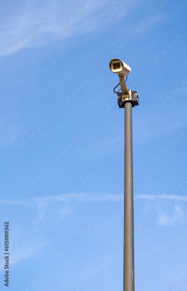 Camera on the public road. Surveillance with security cameras on the street for the safety of citizens.