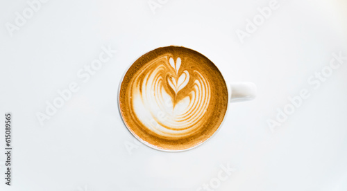 Top view of hot coffee latte art isolated on white background