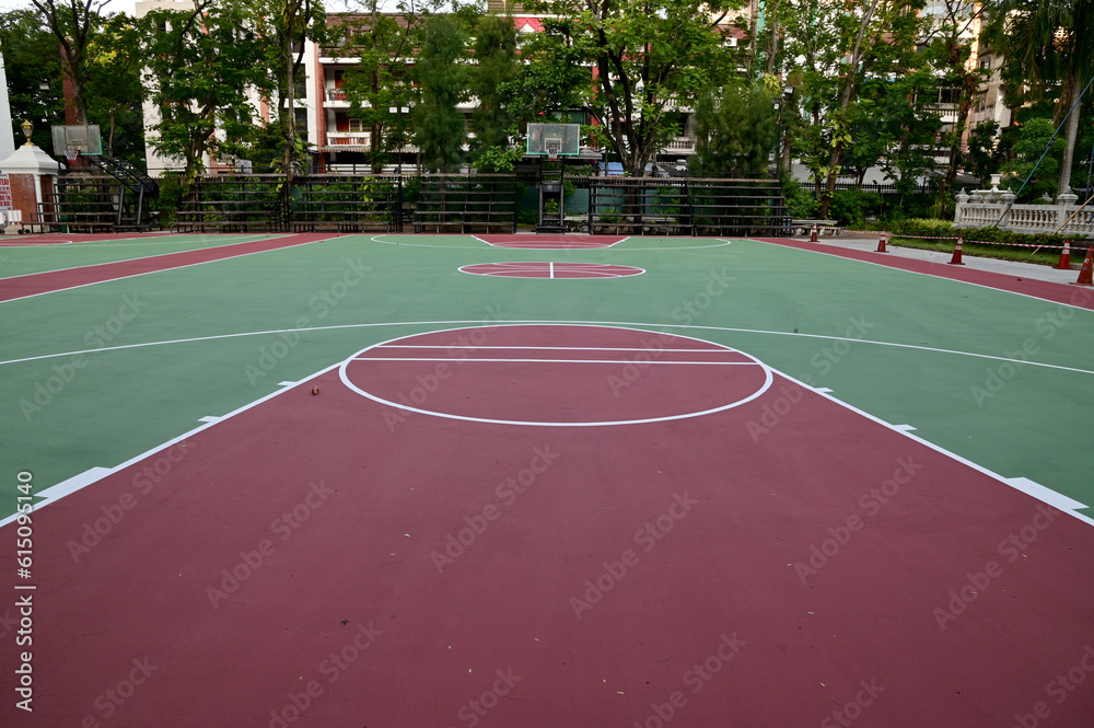 Fototapeta premium Colorful Floor volleyball, futsal, basketball, badminton court with outdoor amphitheater in the school and universities. ourdoor sports concept.