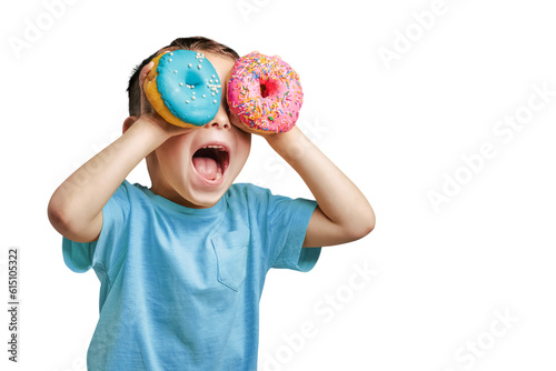 Fototapet Happy cute boy is having fun played with donuts on png background